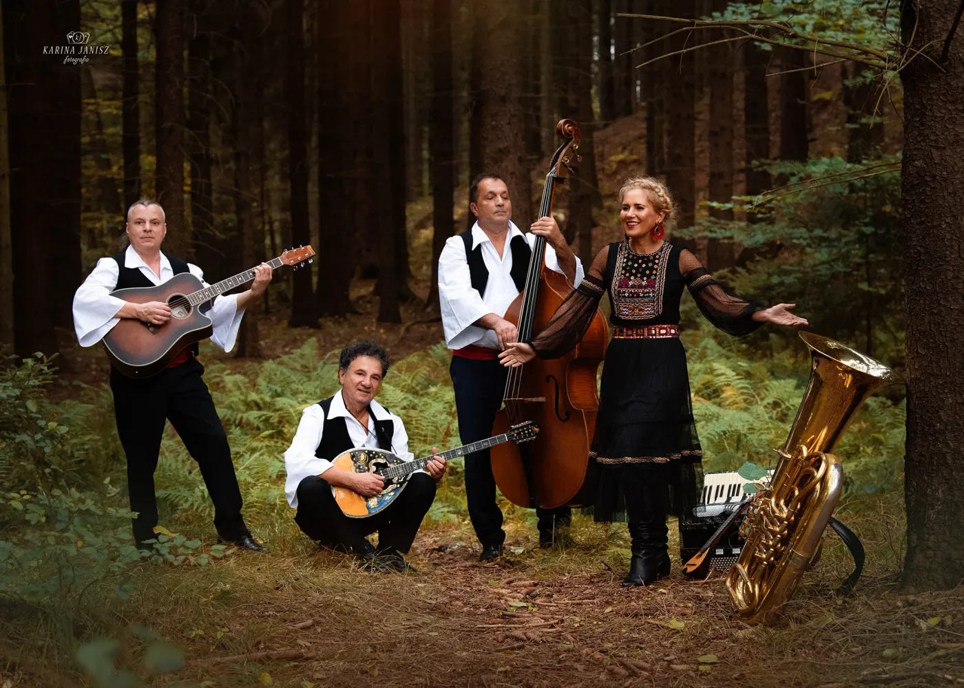 Mythos Greek band with instruments in forest setting